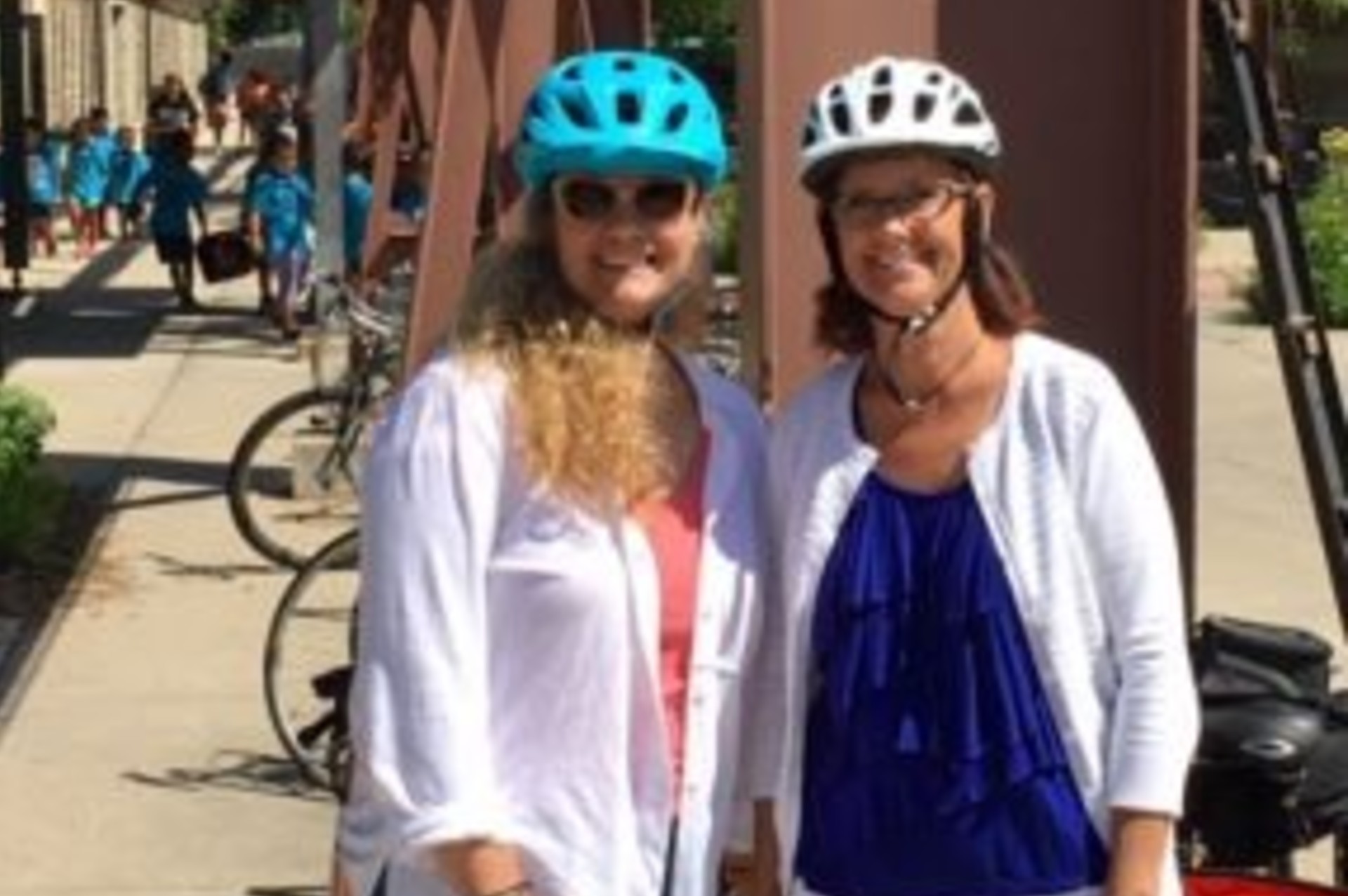 Green Team members Emily and Rochelle biking to Sustainability sessions