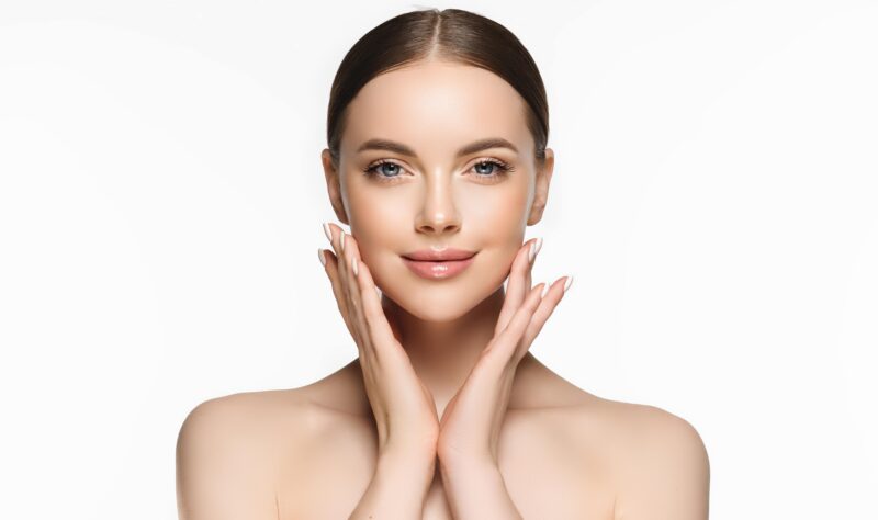 Beautiful young woman with clean fresh skin on face